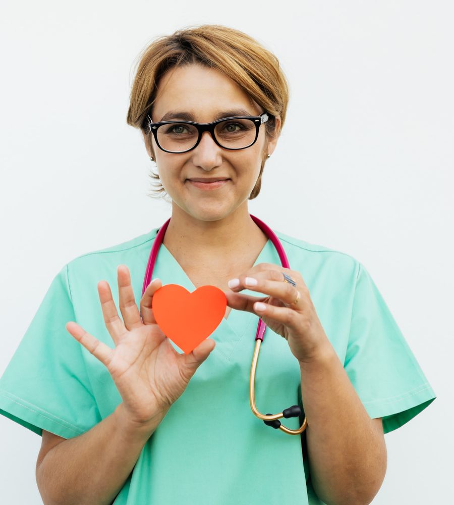 Cardiologist holding a heart symbol